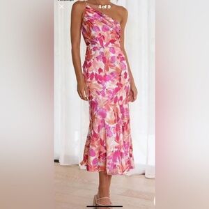 Brand new dress size large! A satin type material .